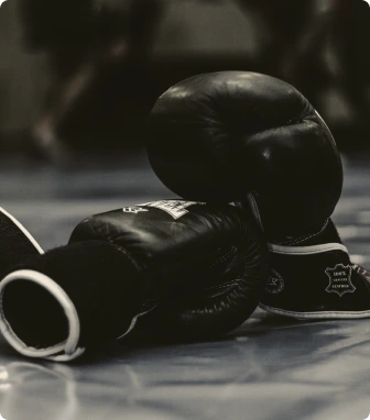 Two boxing gloves on the floor