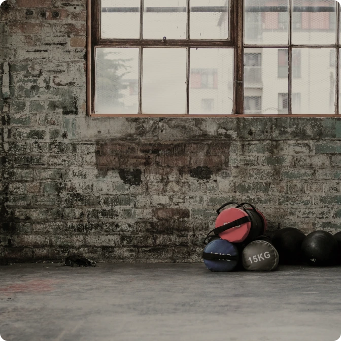 Man hitting heavy bag with boxing glove